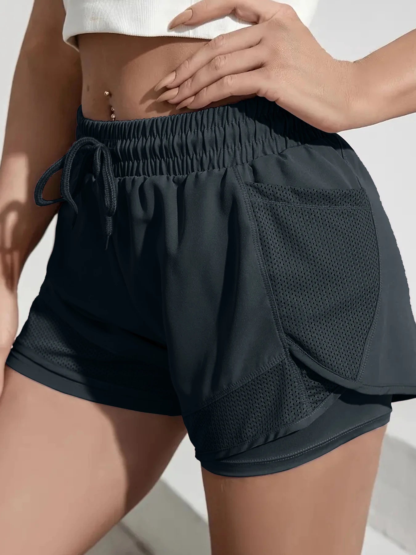 Short de sport élastique pour femme, short avec poches, faux legging de yoga deux pièces pour la course et l'entraînement