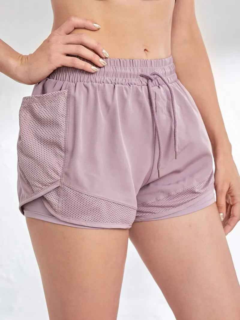 Short de sport élastique pour femme, short avec poches, faux legging de yoga deux pièces pour la course et l'entraînement