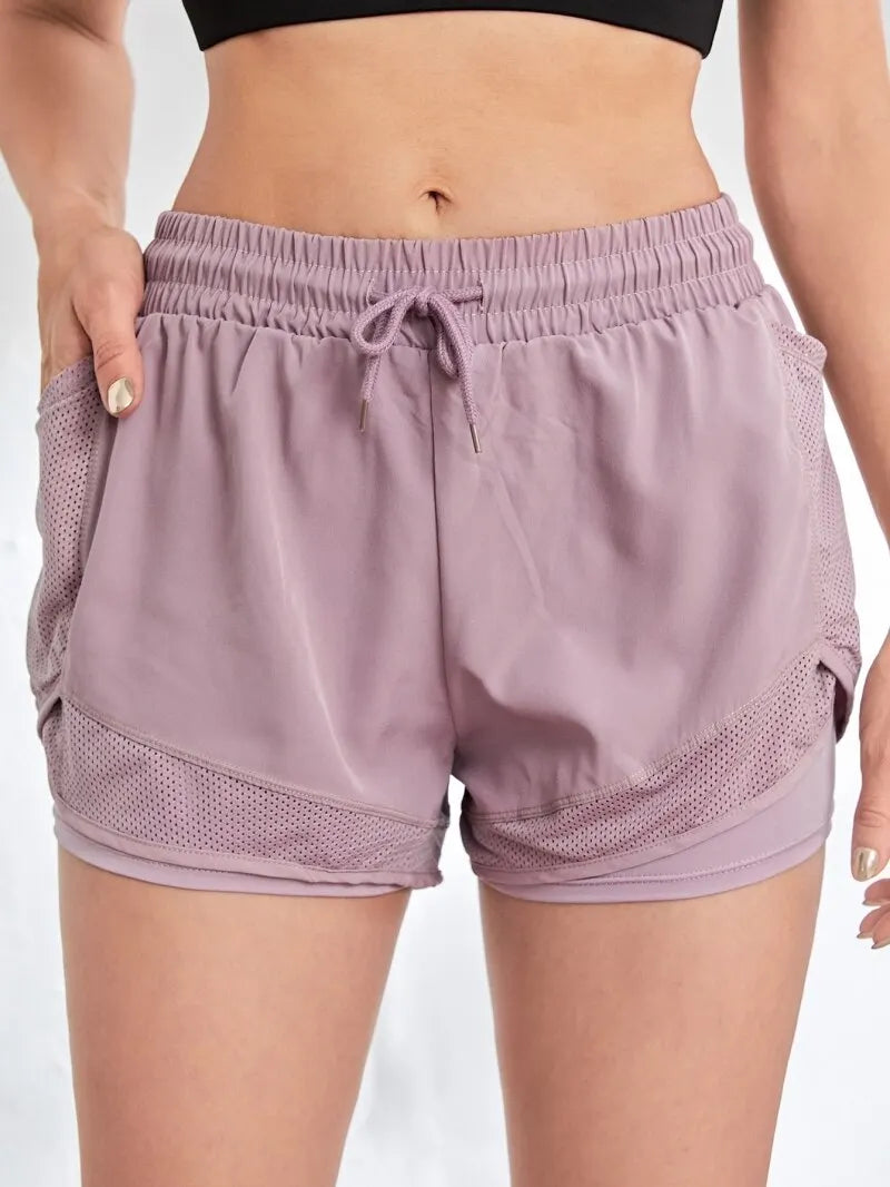 Short de sport élastique pour femme, short avec poches, faux legging de yoga deux pièces pour la course et l'entraînement