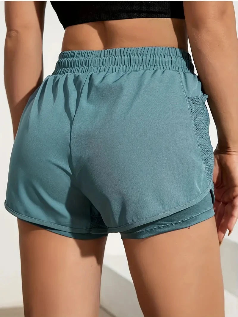 Short de sport élastique pour femme, short avec poches, faux legging de yoga deux pièces pour la course et l'entraînement