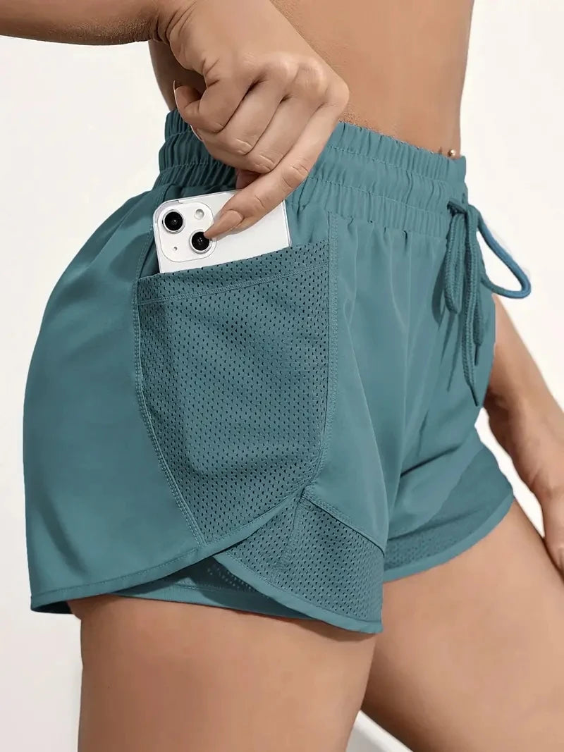 Short de sport élastique pour femme, short avec poches, faux legging de yoga deux pièces pour la course et l'entraînement